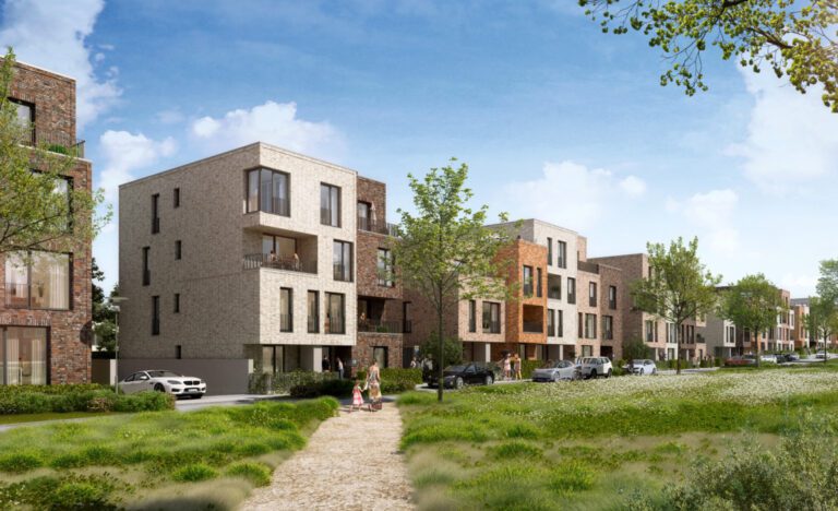 Moderne Wohnbebauung mit Mehrfamilienhäusern und Stadthäusern in ruhiger Lage, umgeben von Grünflächen und Fußwegen in einem neu entwickelten Stadtquartier.