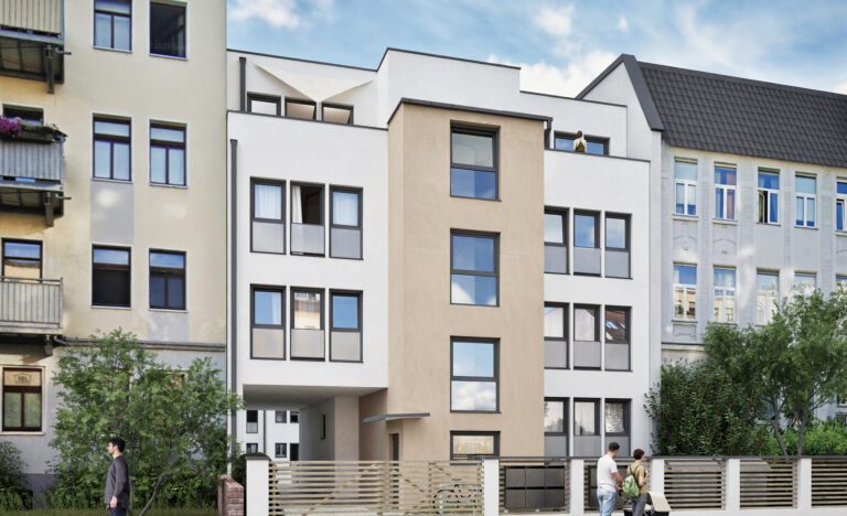 Helle Fassadenansicht der Neubauwohnungen Halle Südstraße mit moderner Architektur, bodentiefen Fenstern und einer hochwertigen Kombination aus weißen und sandfarbenen Elementen.