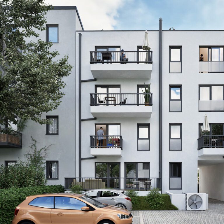 Moderne Neubauwohnungen in Halle Südstraße in zeitlosem Weiß mit großzügigen Balkonen, gepflegten Grünanlagen und PKW-Stellplätzen direkt am Gebäude.